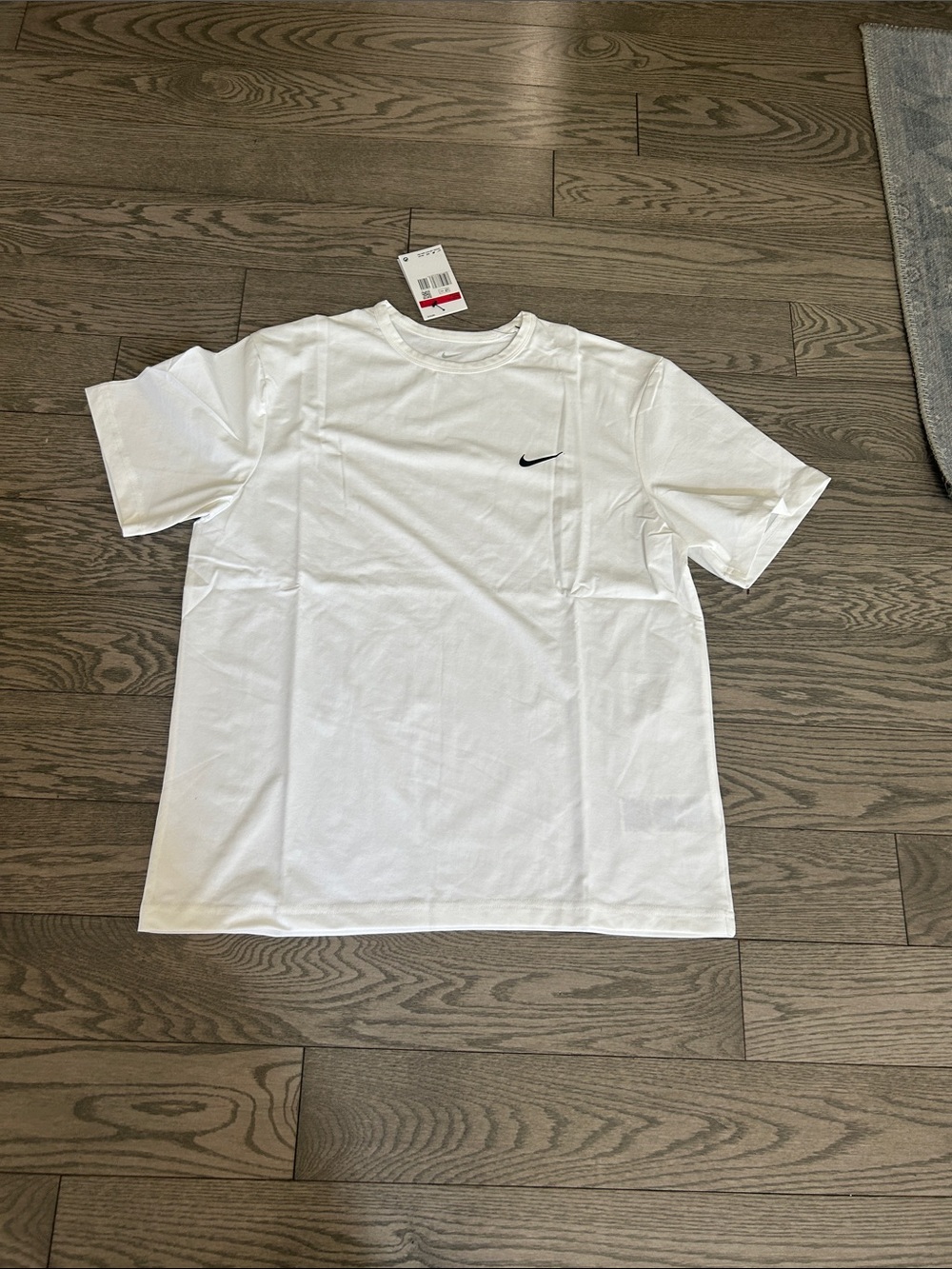 Nike White Short-Sleeve Crew Tee with Black Swoosh